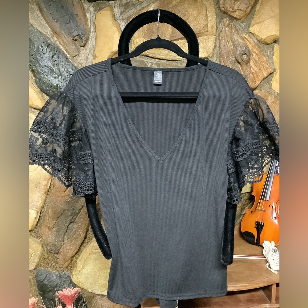 Black 100% polyester top lace bell sleeve V-Neck tie back